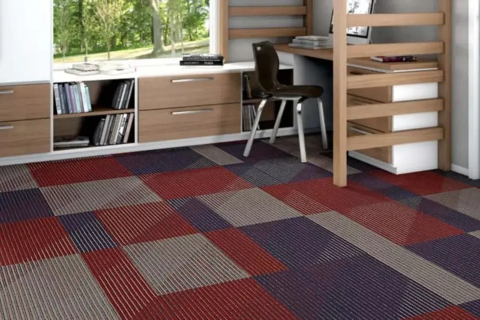 Modern study with colorful geometric patterned carpet tiles, a durable and vibrant flooring solution perfect for creative spaces.
