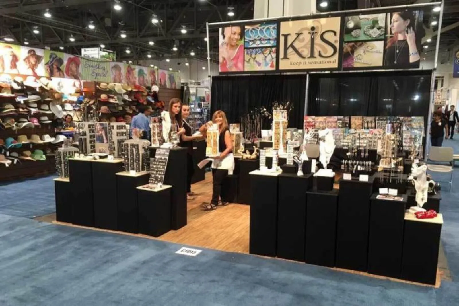 Wood grain foam floor tiles provide a comfortable and professional surface for a trade show booth, creating an inviting and attractive display area.
