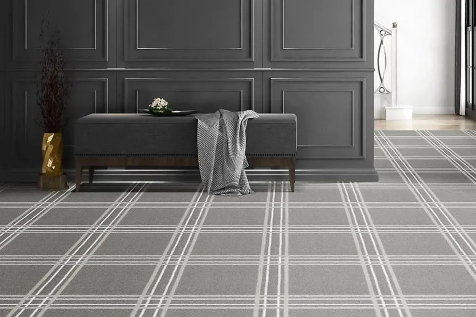 Elegant hallway with a modern gray plaid patterned carpet, a chic and sophisticated flooring choice for residential and commercial spaces.