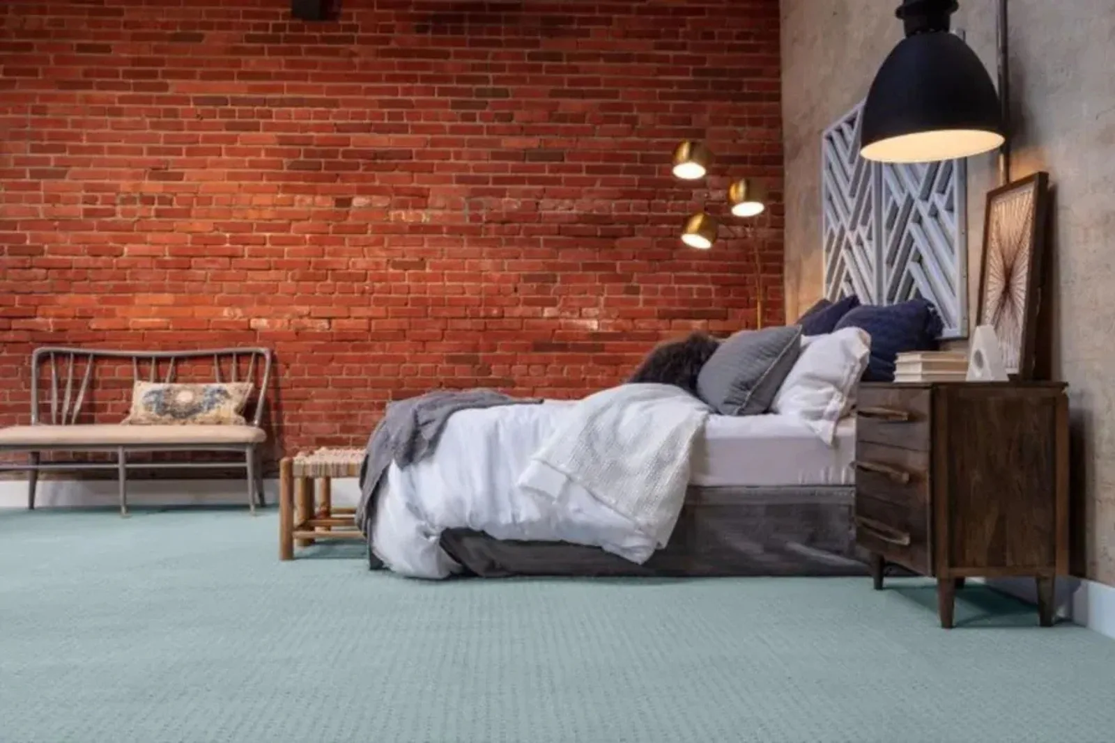 Stylish bedroom with a soft light blue carpet, a comfortable and cozy flooring solution for any residential space.
