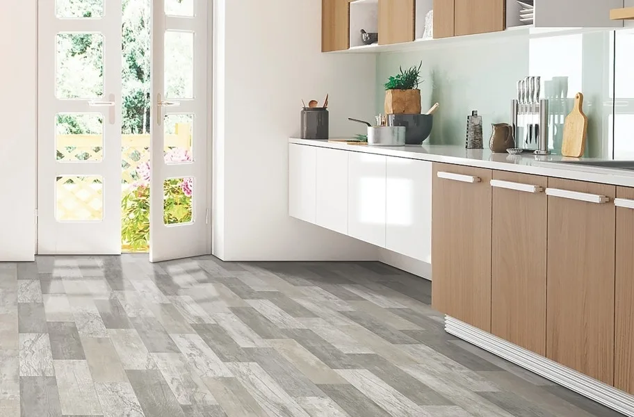 FlooringInc Vinyl Sheet Buying Guide: gray wood-look vinyl sheet floor.