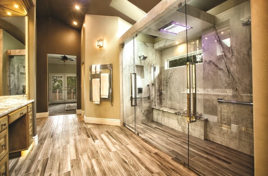 bathroom and shower with wood look tile