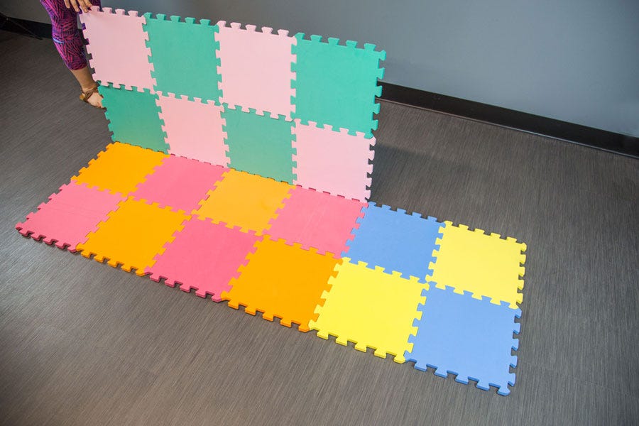 How to Build a Fort with Foam Tiles in 6 Easy Steps: Take your foam floor to the next level with this easy activity. Fun for parents and kiddos alike!