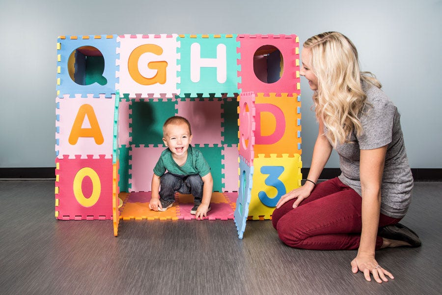 How to Build a Fort with Foam Tiles in 6 Easy Steps: Take your foam floor to the next level with this easy activity. Fun for parents and kiddos alike!