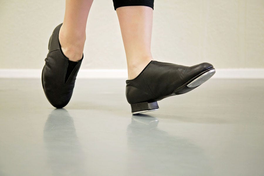 Gray Prostep dance floor tolls with a tap dancer on them