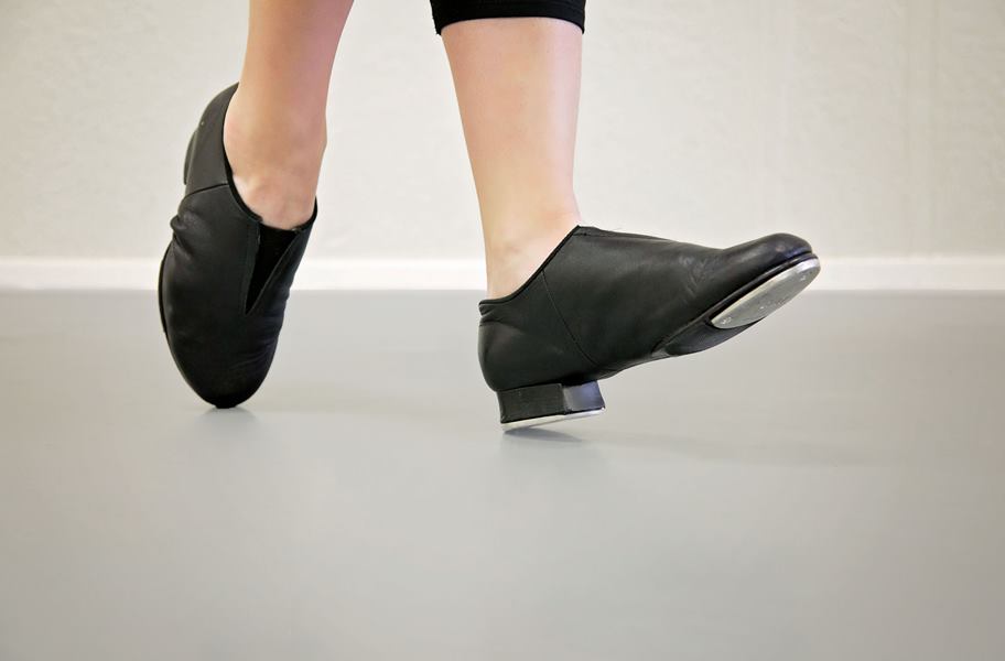 Tap Dancer on adagio tour dance flooring