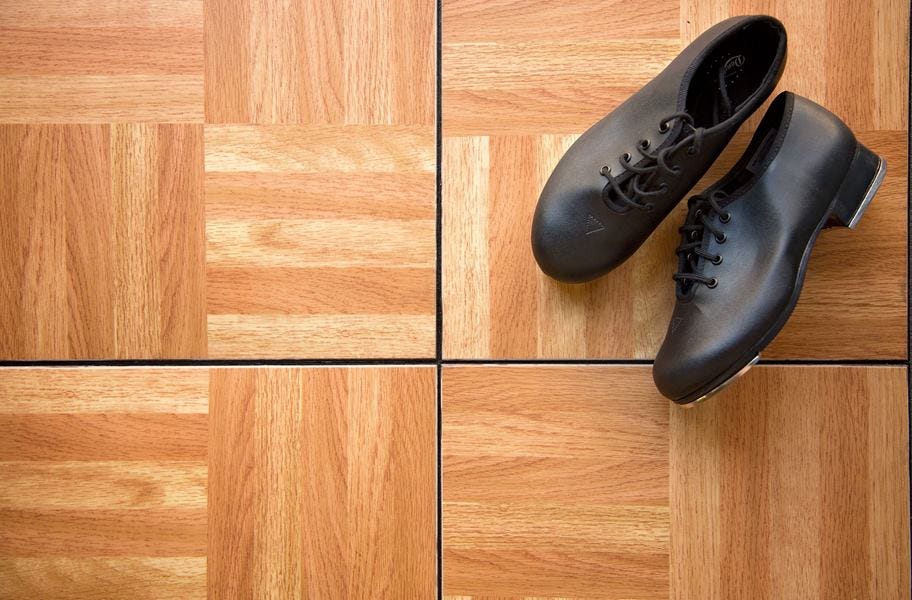 Modular Grid-Loc Tiles with dance shoes on them