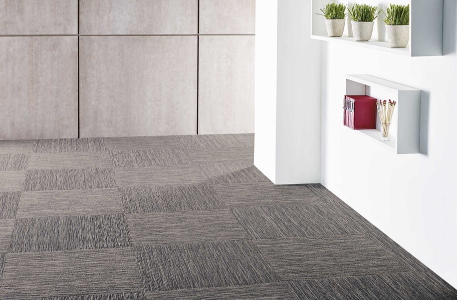 Gray carpet squares in a commercial setting