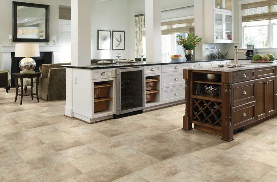 FlooringInc Vinyl Sheet Buying Guide: stone-look vinyl roll flooring in a ktichen