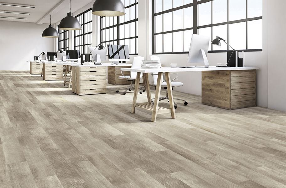 Luxury vinyl plank flooring in modern, open office space