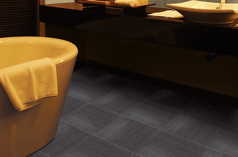 gray tile flooring in a bathroom setting