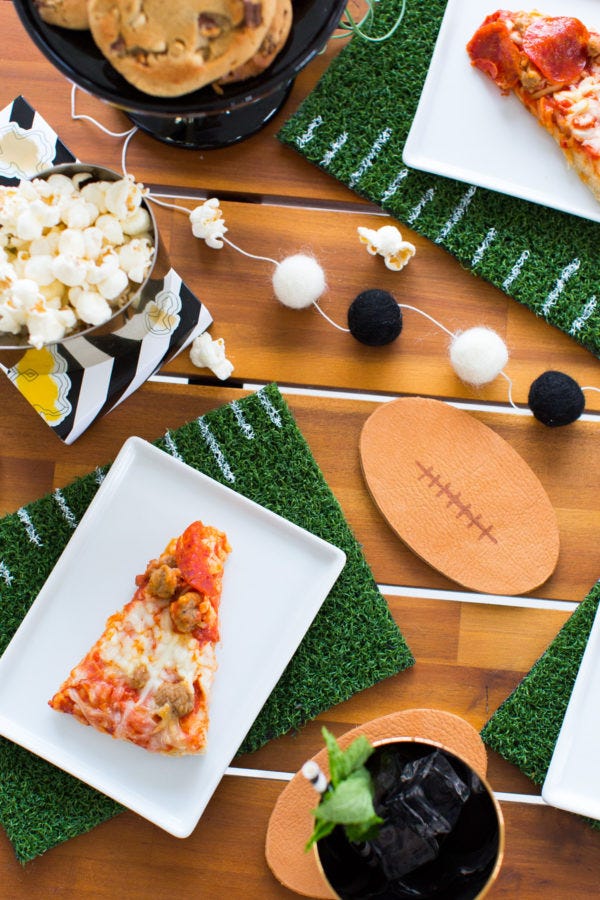Leftover turf used for DIY coasters and placements with popcorn and pizza