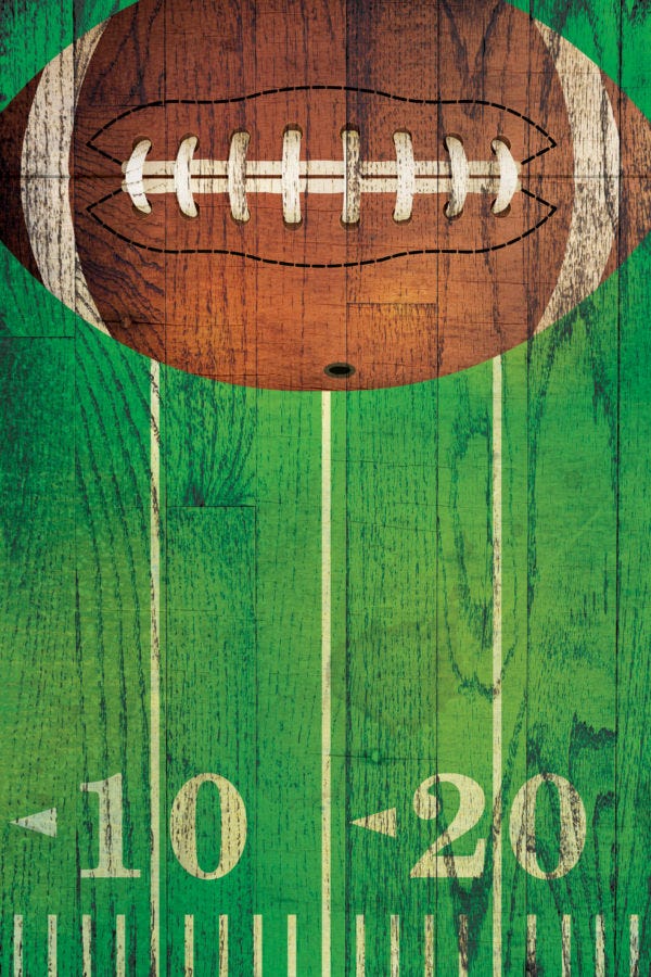 Football and football field painted on a pallet