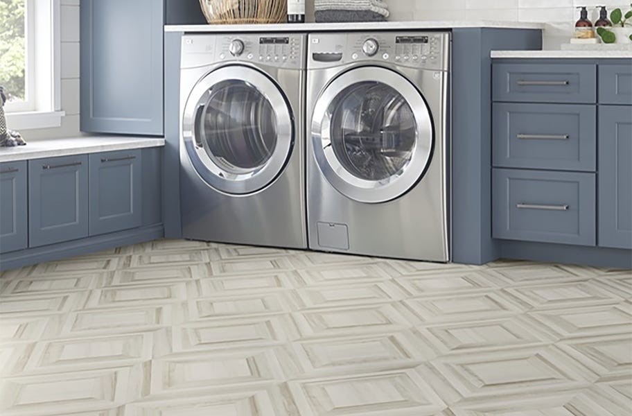 Blue cabinetry in a laundry room setting