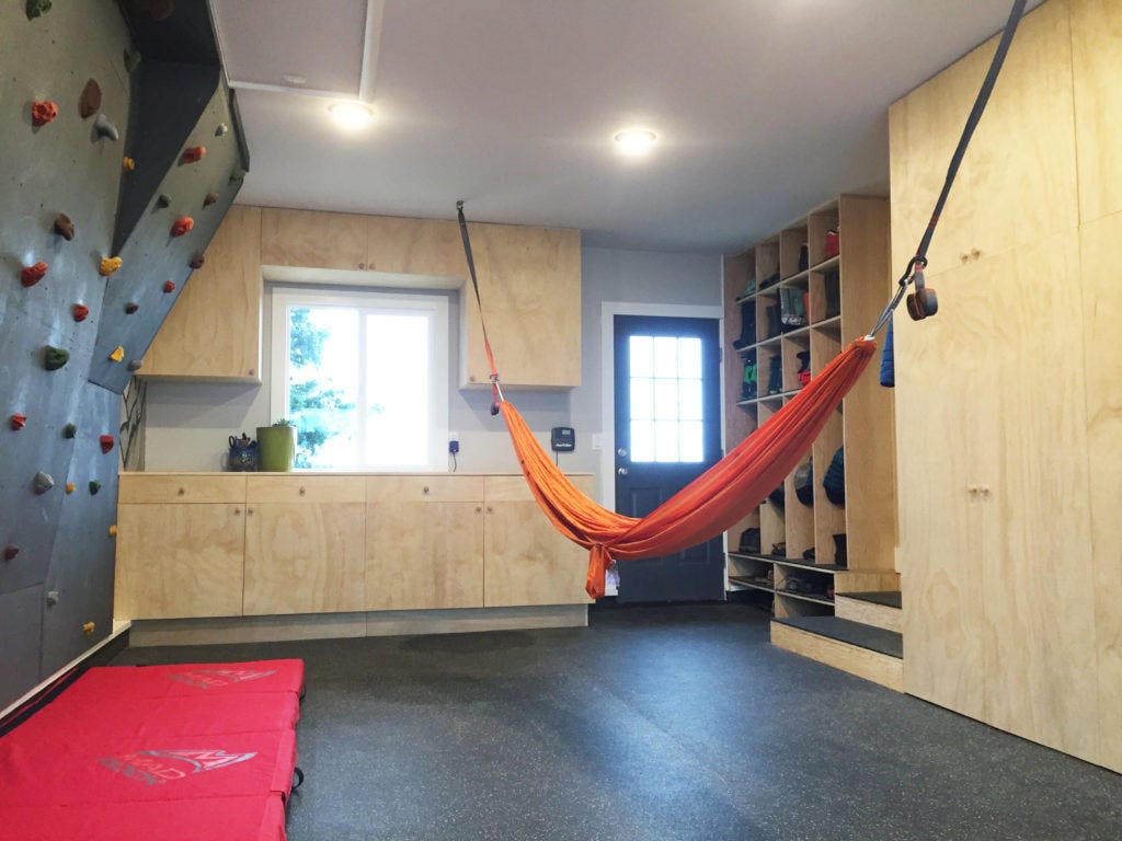 Flooring Inc 8mm Rubber Rolls in garage setting with hammoc