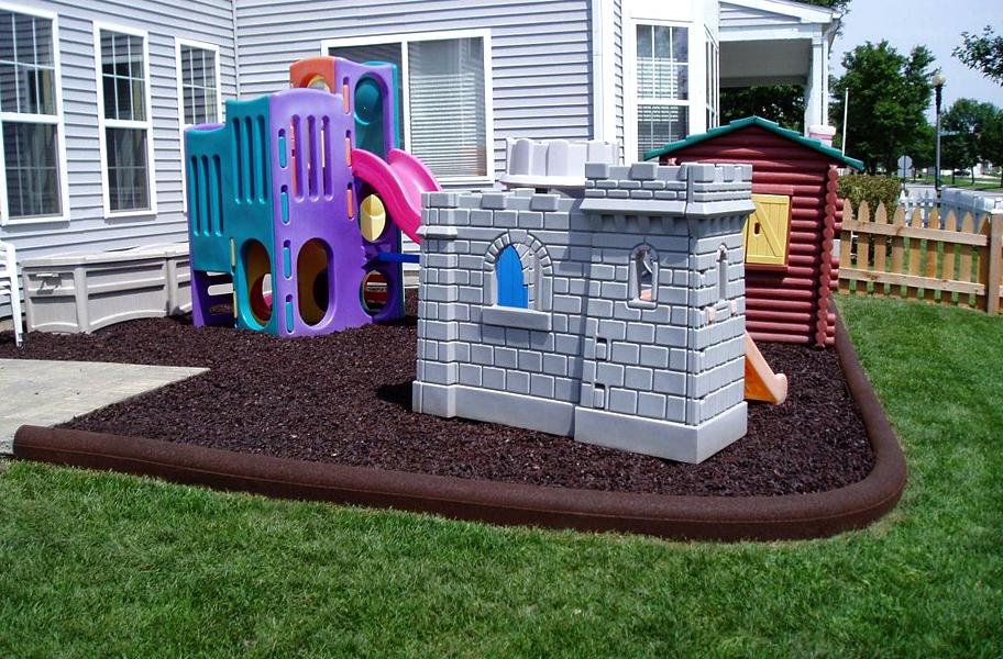 Flooring Inc Rubber Timbers in playground setting