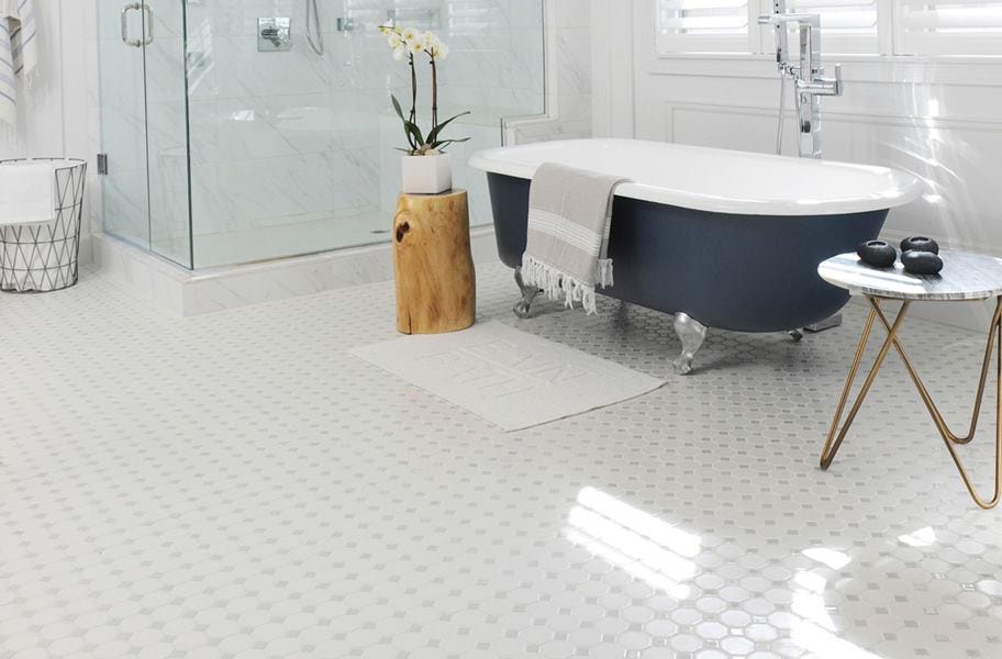 white hexagon floor tile in bathroom