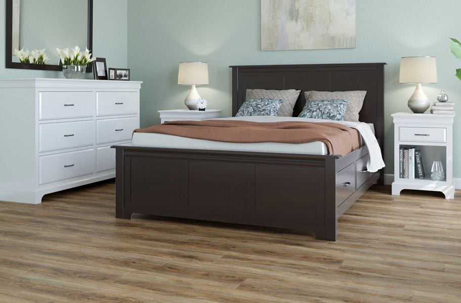 vinyl flooring in bedroom with dark bedframe and white drawers