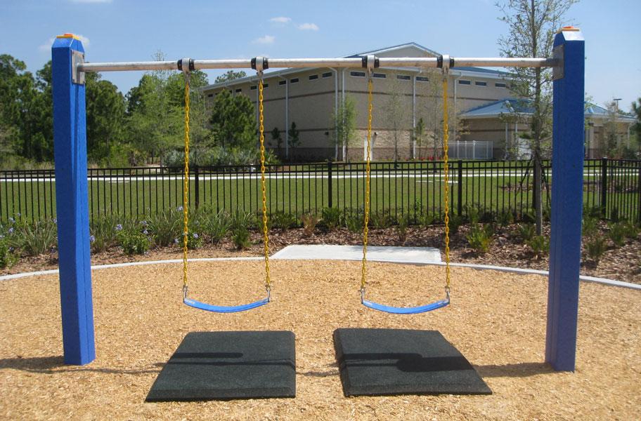 black swing mats under playground swings