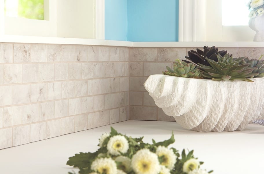 Stone-look wall tile in a kitchen backsplash