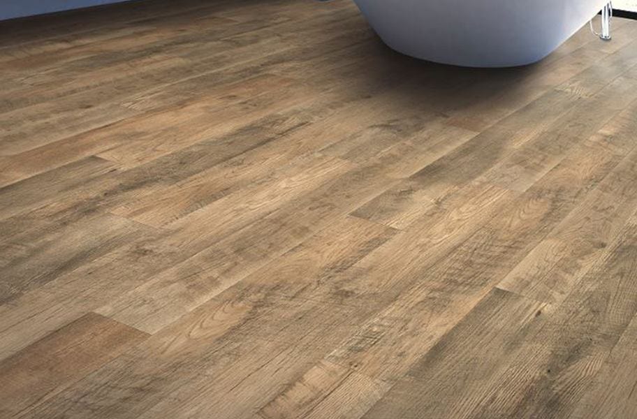 FlooringInc bathroom flooring options example: Bathroom with waterproof laminate wood-look floor.