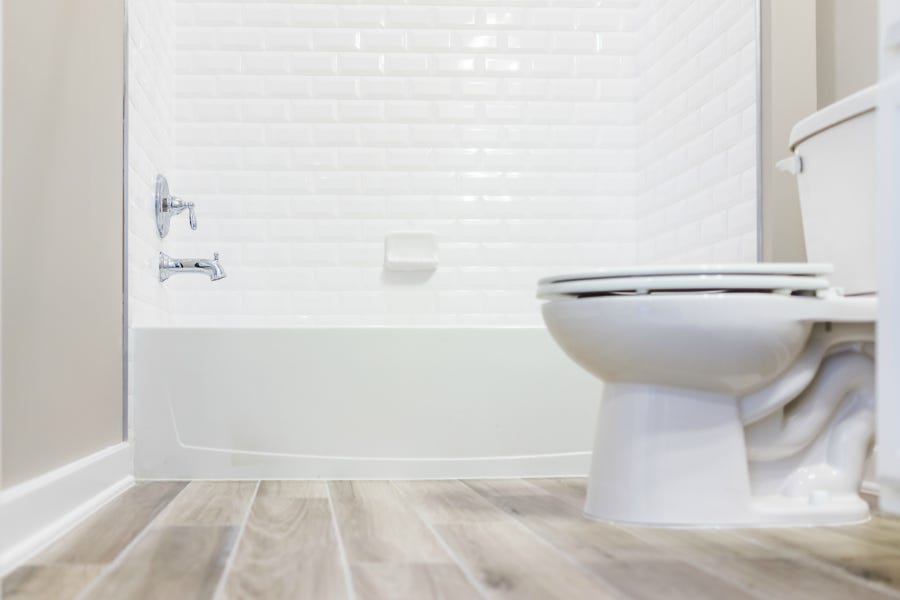 Bathroom with wood-look plank floors