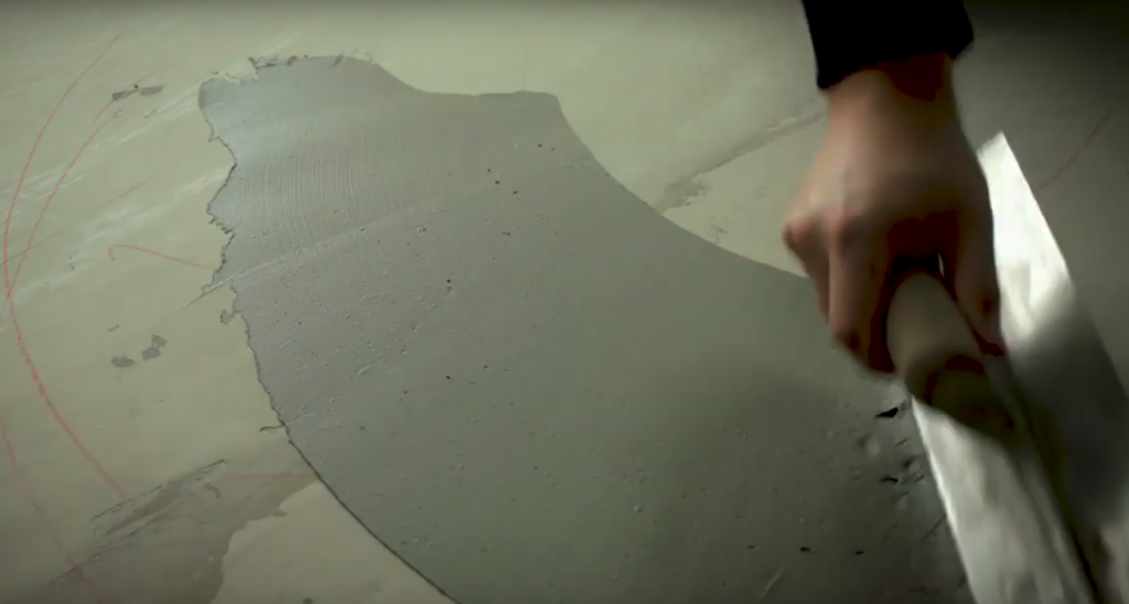 Leveling a concrete subfloor before tile installation