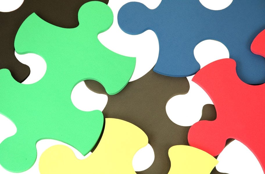 Close up view of foam tiles shaped like puzzle pieces