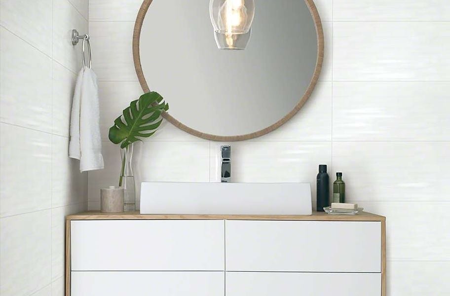 Light wall and floor tile in a bathroom setting