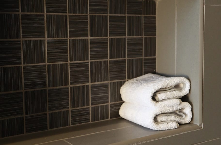 Daltile fabrique mosaic tile in a crosshatch pattern