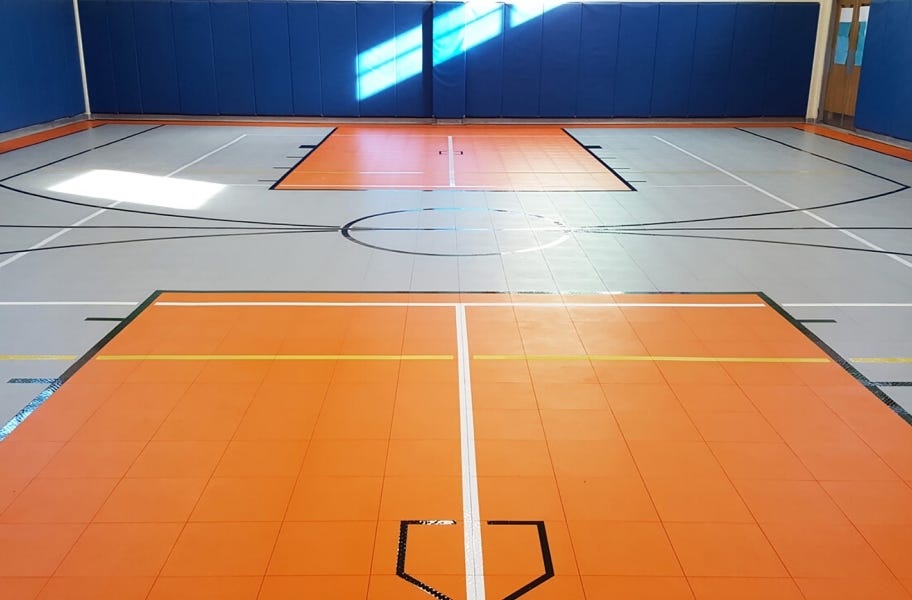 Court floor tile install guide: premium indoor court tiles in a gymnasium