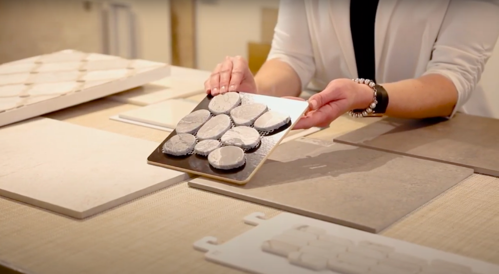How to Choose Tile: stone-look pebble floor tile for bathrooms
