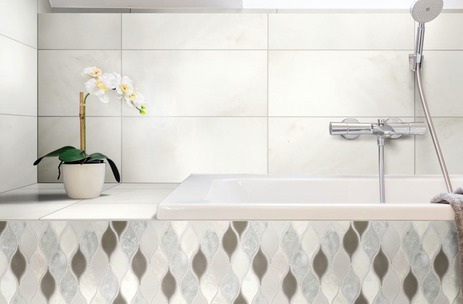 Leaf-shaped backsplash tile in a bathroom