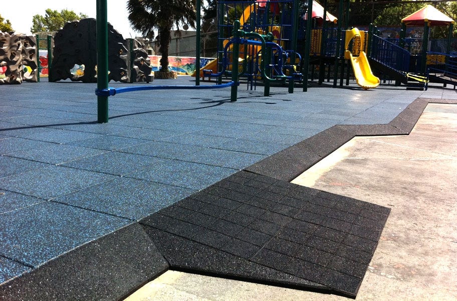 Image of Jamboree Designer 1" ADA Compliant Ramps creating an easier transition to main playground flooring. 