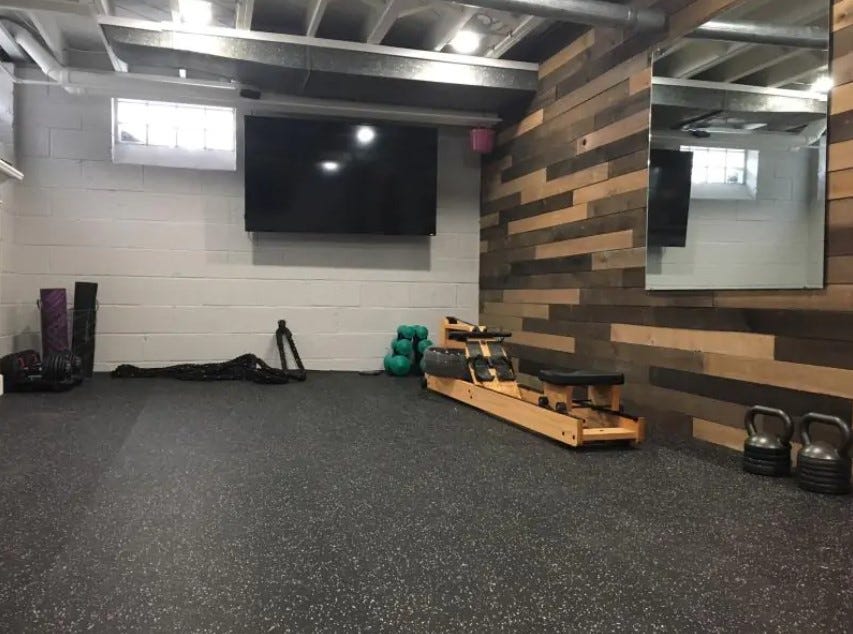 Rolled rubber flooring in a basement gym