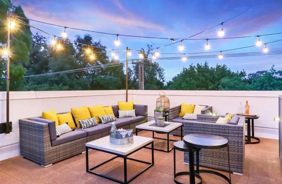 Rooftop deck tiles used in a fun outdoor rooftop space for entertaining.