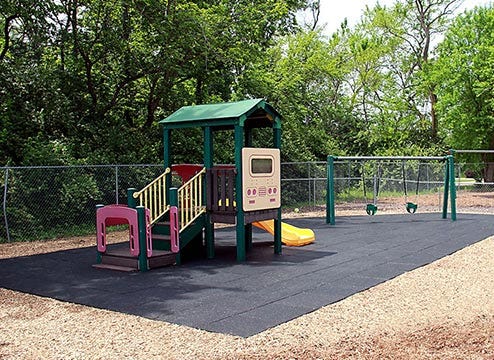 Playground with rubber flooring