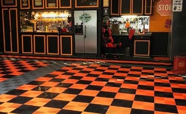 coin grid-loc garage tiles installed in a Harley color theme